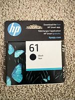 Front of sealed HP 61 black ink cartridge box showing model and color