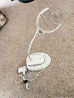 Lamp overall: lens, gooseneck, base and adapter shown