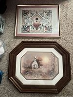 Both framed artworks side by side