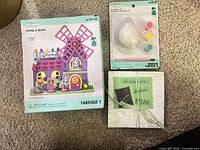 All three packaged items on carpet