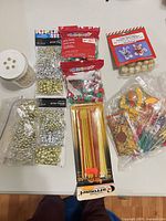 All items grouped on table showing variety of craft supplies