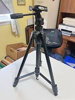 Full view of Promaster 7100 tripod standing on table