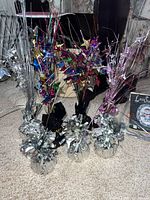 All six mylar balloon weight centerpieces grouped together