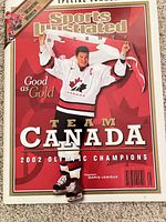 Front cover of Sports Illustrated Presents Team Canada 2002 Olympic Champions magazine showing Mario Lemieux