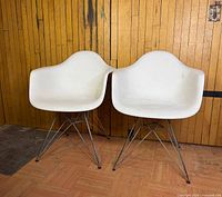 Both chairs front view showing overall design and condition