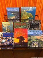 All seven books arranged on rack