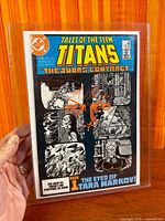 Front view of Tales of the Teen Titans #42 in sleeve