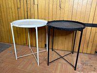 Black and white Gladom tray tables front view