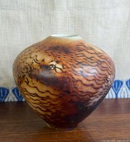 Front profile of vase showing overall form and surface pattern