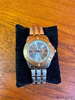 Front view of Invicta ladies wristwatch on cushion