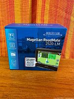 Front of sealed Magellan RoadMate 2520-LM box