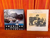 Front covers of both albums