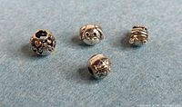 Group of four sterling silver Pandora charms