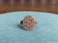 Frontal view of oval CZ cluster ring