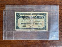 Banknote inside sleeve showing obverse