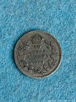 Reverse of coin showing denomination, wreath and date