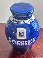 Front view showing Correios lettering and swirl logo