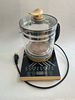 Full view of kettle on heating base