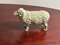 side view of ram figurine on tabletop