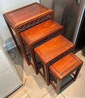 All four nesting tables side by side to show sizes