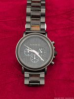 Front view of Bobobird wristwatch on red background