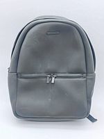 Front view showing overall design, color, front pocket and scuffs