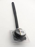 Full view of GrillPro bristle-less brush in packaging