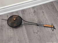 Full view of round mesh grill basket