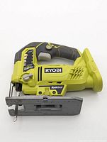Left side view of Ryobi P523 jigsaw showing full tool without battery or blade