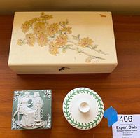 Three boxes grouped: wooden floral jewelry box, green cameo square trinket box, white round vine-border trinket box