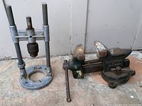 Bench vise and drill guide side by side