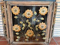 Full view of tri-fold sunflower fireplace screen showing design and dimensions context