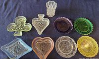 Group shot of all nine pressed glass items