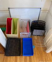 Group shot of whiteboard and assorted organizers