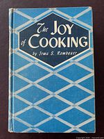 Front cover showing title, author and blue lattice design