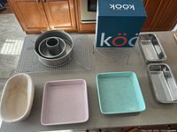 Group shot showing all bakeware items and Kook kit