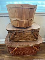 Three stacked baskets showing overall styles and materials