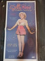 Full view of the poster showing image, text and overall wear