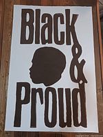 Full view of the hand-painted poster showing text, silhouette and overall condition