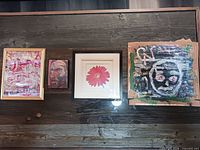 All four framed artworks side by side