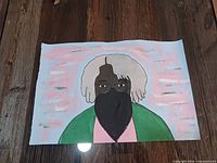 full view of unframed portrait painting on wood surface