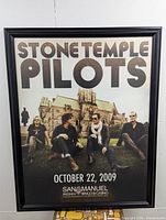 Full view of framed Stone Temple Pilots concert poster