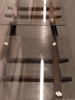 Top view highlighting glass surface and mounting hardware