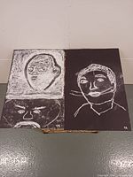 Both charcoal drawings side by side