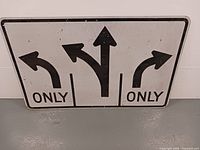 front view showing three arrows and ONLY text