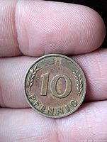 Obverse of German 10 Pfennig coin with denomination and mint mark