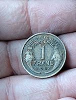 Reverse side with denomination 1 FRANC and date 1931