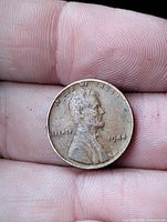 Obverse of 1944 Lincoln wheat cent showing date and LIBERTY inscription