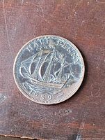 Reverse of 1959 UK half penny showing Golden Hind ship design and date