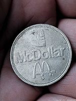 Obverse showing Loblaws logo and McDollar text